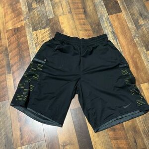 Nike Men's Black Shorts with Yellow Accents